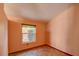 Bedroom with tile flooring and a window providing natural light at 7806 Ontario Street Cir # 7806, Sarasota, FL 34243