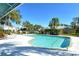 Inviting community pool with lounge chairs and a surrounding patio area at 7806 Ontario Street Cir, Sarasota, FL 34243