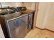 Laundry room with modern washer and dryer at 7806 Ontario Street Cir # 7806, Sarasota, FL 34243
