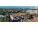 Condo building with water view and bridge in background at 850 S Tamiami Trl # 402, Sarasota, FL 34236