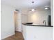 Kitchen features granite countertop and a breakfast bar at 850 S Tamiami Trl # 402, Sarasota, FL 34236