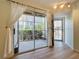 Living room with sliding doors leading to the patio at 850 S Tamiami Trl # 402, Sarasota, FL 34236