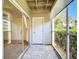 Bright screened patio access from living area, features storage at 850 S Tamiami Trl # 402, Sarasota, FL 34236