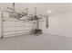 Garage with overhead storage and epoxy floor at 10124 Silent Night Ln, Sarasota, FL 34241