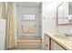 Bathroom with bathtub, shower, and neutral color scheme at 1111 49Th Avenue W Dr, Bradenton, FL 34207