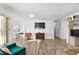 Open concept living room with wood-look floors at 1111 49Th Avenue W Dr, Bradenton, FL 34207
