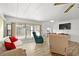 Living room with large TV and comfortable seating at 1111 49Th Avenue W Dr, Bradenton, FL 34207