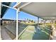 Covered shuffleboard courts providing recreational space for residents at 1111 49Th Avenue W Dr, Bradenton, FL 34207