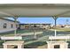 Shuffleboard courts with covered seating for community members at 1111 49Th Avenue W Dr, Bradenton, FL 34207