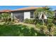 House exterior and well-manicured lawn at 153 Soliera St, Nokomis, FL 34275