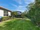 Landscaped backyard with pool and gazebo at 153 Soliera St, Nokomis, FL 34275