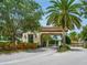Gated community entrance with palm trees at 153 Soliera St, Nokomis, FL 34275