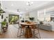 Casual dining area with round wooden table and metal chairs at 153 Soliera St, Nokomis, FL 34275