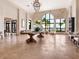 Spacious lobby with high ceilings, stone accents, and water views at 153 Soliera St, Nokomis, FL 34275