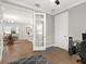 Home office with a view into the kitchen and dining area at 153 Soliera St, Nokomis, FL 34275