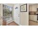 Bright and airy entryway with a view into the updated kitchen at 1708 Glenhouse Dr # 414, Sarasota, FL 34231