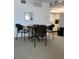 Dining area with round table and four chairs at 1714 69Th W Ave # A207, Bradenton, FL 34207