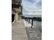 Shared walkway alongside the canal offering scenic views at 1714 69Th W Ave # A207, Bradenton, FL 34207