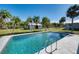 Inviting pool area with a shed at 18671 Macgill Ave, Port Charlotte, FL 33948