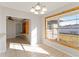 Sunlit dining room features built-in shelving and large window at 1915 43Rd W St, Bradenton, FL 34209