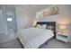 Light and airy bedroom with ensuite bathroom access at 230 W Pine Valley Ln, Rotonda West, FL 33947