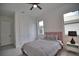 Serene bedroom with double doors and window at 230 W Pine Valley Ln, Rotonda West, FL 33947