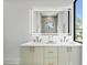 Elegant bathroom with double vanity and a large mirror at 2554 Arlington St, Sarasota, FL 34239