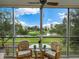 Enjoy the view from this lanai with seating for two and a ceiling fan at 3620 Ironwood Cir # 304O, Bradenton, FL 34209