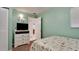 Bedroom with a double bed and built-in shelving at 3705 E Bay Dr # 212, Holmes Beach, FL 34217