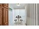 Bright breakfast nook with table and chairs, perfect for small meals at 3705 E Bay Dr # 212, Holmes Beach, FL 34217