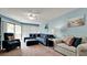 Living room with sectional sofa and armchairs at 3705 E Bay Dr # 212, Holmes Beach, FL 34217