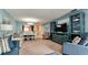 Living room with sectional sofa and entertainment center at 3705 E Bay Dr # 212, Holmes Beach, FL 34217