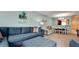 Spacious living room with sectional sofa and dining area view at 3705 E Bay Dr # 212, Holmes Beach, FL 34217