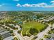 Community view with tennis courts, playground, and a lake at 5032 Newport News Cir, Bradenton, FL 34211