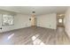 Large living room with wood flooring and hallway access at 5120 33Rd E St, Bradenton, FL 34203