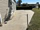 Concrete patio area adjacent to the house at 5151 Pebble Beach Ave, Sarasota, FL 34234