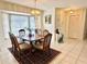 Spacious dining area with a table and six chairs at 5277 San Luis Ter, North Port, FL 34286