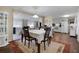 Dining area with table and chairs, located near the kitchen and living room at 5407 Bali Ct, Bradenton, FL 34207