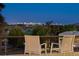 Relaxing balcony with city lights view perfect for enjoying the evening at 545 Sanctuary Dr # B406, Longboat Key, FL 34228