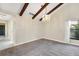 Spacious dining room with high ceilings and a crystal chandelier at 5569 Boulder Blvd, Sarasota, FL 34233