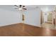 Living room with hardwood floors and neutral walls at 6111 Braden Run, Bradenton, FL 34202