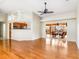 Bright living room featuring hardwood floors and access to a patio at 6600 Deering Cir, Sarasota, FL 34240