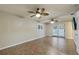 Large Gathering room with tile floors and double doors at 6915 11Th Nw Ave, Bradenton, FL 34209