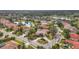 Aerial view of upscale residential neighborhood with golf course and lake at 7042 Twin Hills Ter, Lakewood Ranch, FL 34202