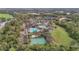 Aerial view of community amenities including pools, clubhouse, and basketball courts at 7042 Twin Hills Ter, Lakewood Ranch, FL 34202