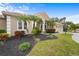 Well-maintained house with manicured lawn and palm trees at 7042 Twin Hills Ter, Lakewood Ranch, FL 34202