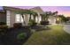 Well-maintained house with manicured lawn and palm trees at 7042 Twin Hills Ter, Lakewood Ranch, FL 34202