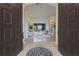 Open foyer with a clear view of the living area and pool creating an inviting atmosphere at 7042 Twin Hills Ter, Lakewood Ranch, FL 34202