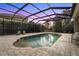 Inviting screened pool area with paved deck at 7042 Twin Hills Ter, Lakewood Ranch, FL 34202