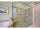 Large walk-in shower with glass enclosure at 7117 Victoria Circle, University Park, FL 34201